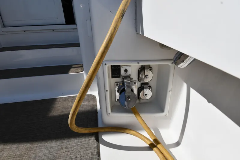 Slide: The Image of Power connections on a 1996 Viking 53 Convertible yacht with yellow cable. - 12