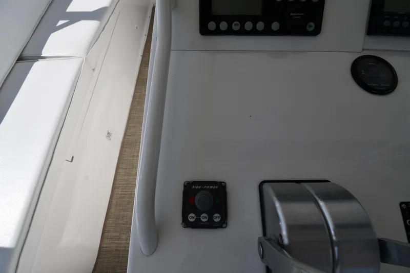 Slide: The Image of Control panel of a 1996 Viking 53 Convertible yacht with navigation instruments. - 20