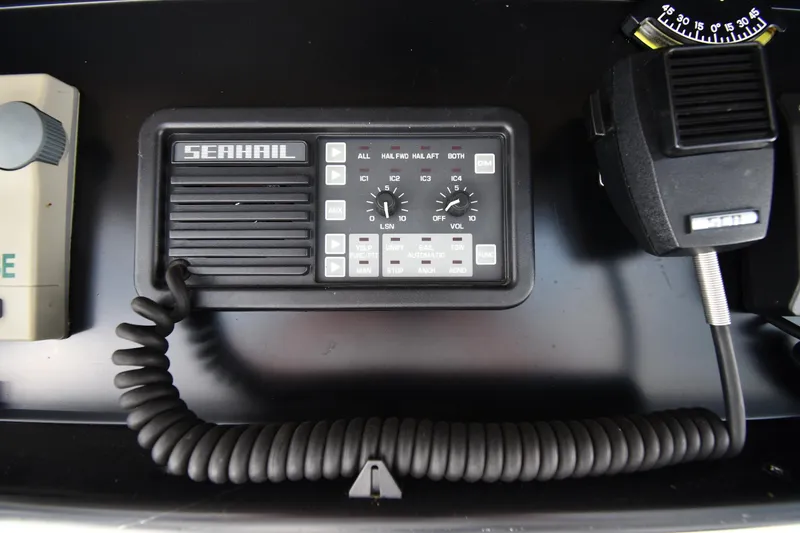 Slide: The Image of Marine communication system on a 1996 Viking 53 Convertible yacht dashboard. - 33