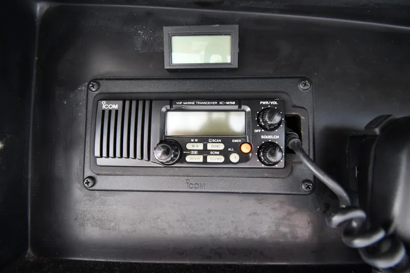 Slide: The Image of VHF marine transceiver in 1996 Viking 53 Convertible boat dashboard. - 36