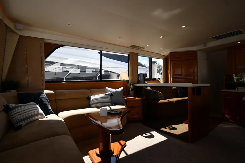 Slide: The Image of Luxurious interior of a 1996 Viking 53 Convertible yacht with plush seating and elegant decor. - 67