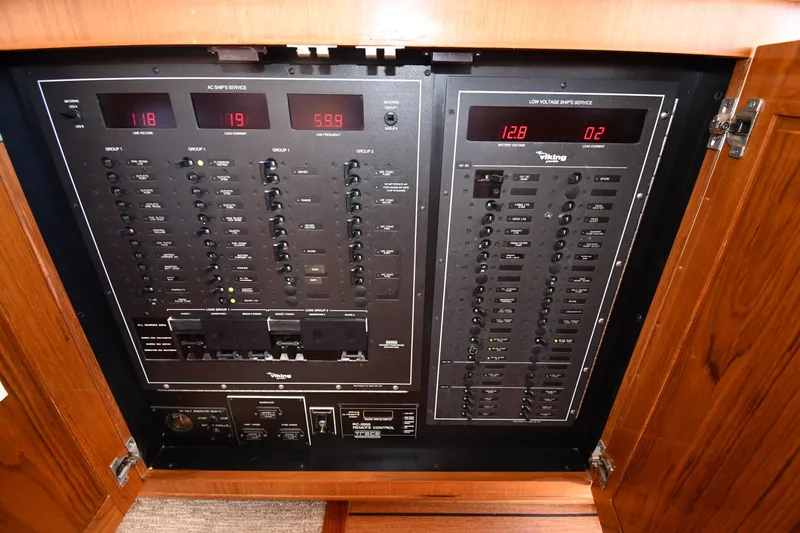 Slide: The Image of Electrical control panel on a 1996 Viking 53 Convertible yacht. - 80