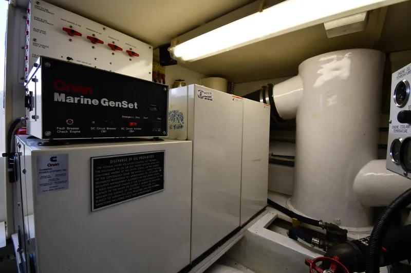 Slide: The Image of Engine room of 1996 Viking 53 Convertible with Onan Marine GenSet. - 87