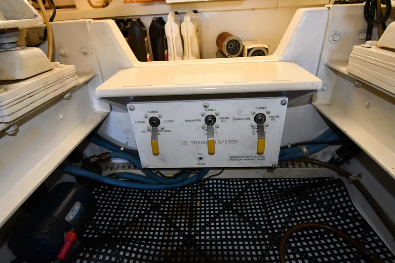 Slide: The Image of Oil transfer system controls on a 1996 Viking 53 Convertible boat. - 92