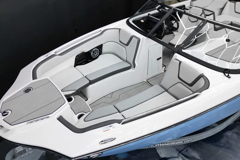 Slide: The Image of 2024 Yamaha Boats 252XE interior, featuring sleek seating and modern design elements. - 10