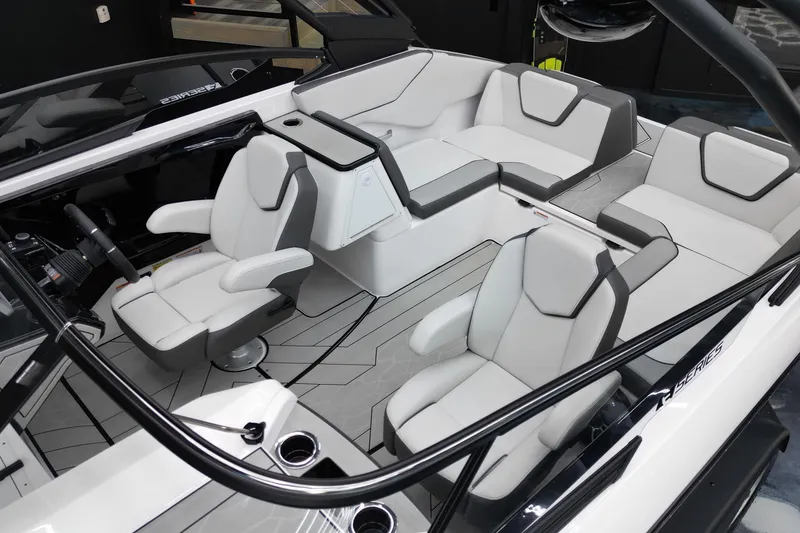 Slide: The Image of 2024 Yamaha Boats 252XE interior with modern seating and sleek design. - 11