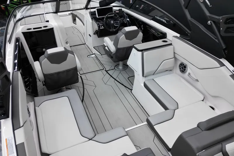 Slide: The Image of 2024 Yamaha Boats 252XE interior with modern seating and sleek design. - 13
