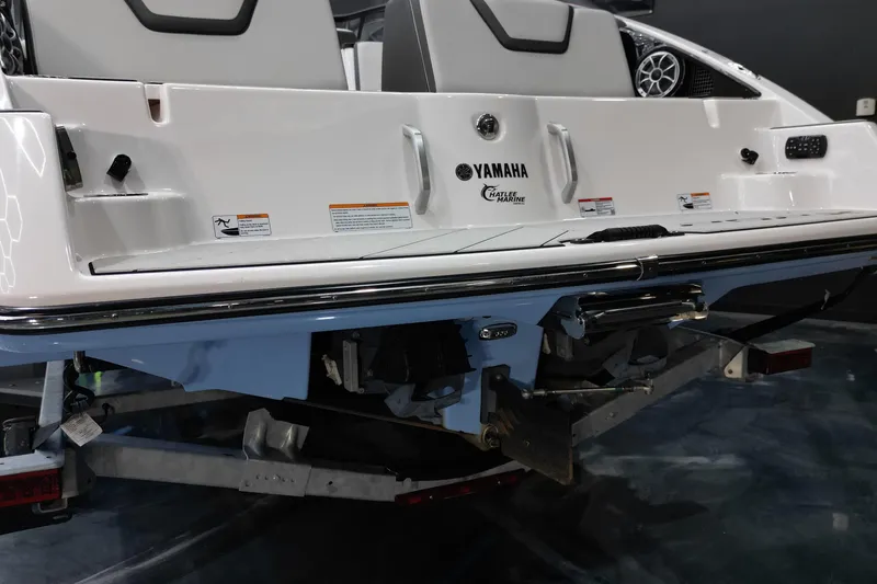 Slide: The Image of 2024 Yamaha Boats 252XE rear view, showcasing sleek design and advanced features. - 17