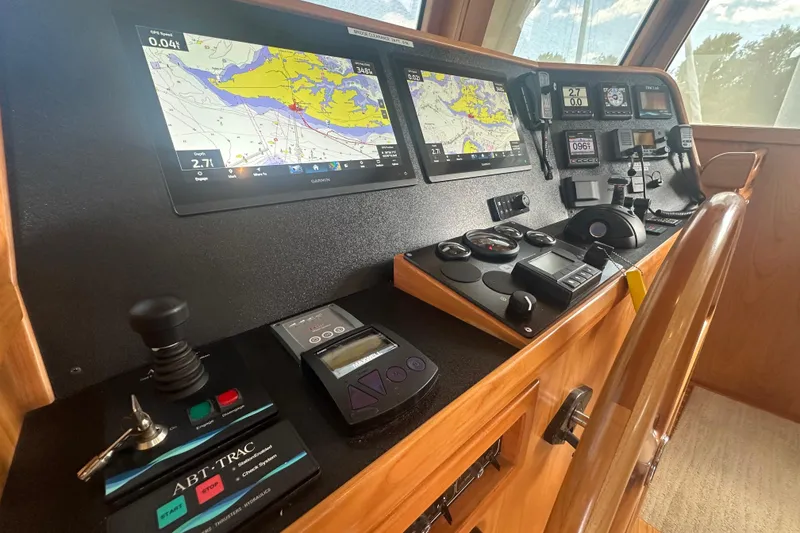 Slide: The Image of Helm of 2021 Kadey-Krogen 44AE with advanced navigation and control systems. - 15