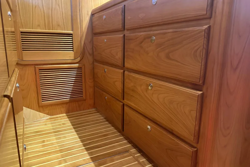 Slide: The Image of Luxurious wooden cabinetry inside 2021 Kadey-Krogen 44AE yacht interior. - 22