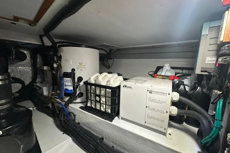 Slide: The Image of Engine room of 2021 Kadey-Krogen 44AE yacht with equipment and wiring. - 37