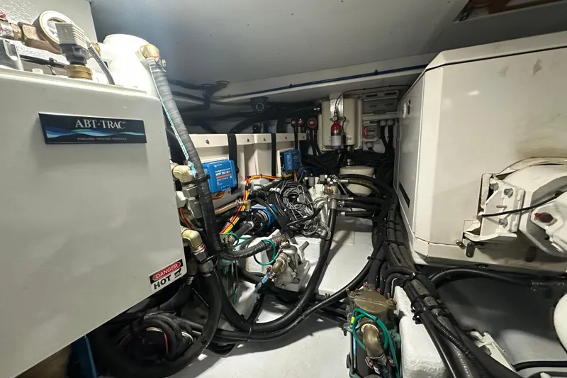 Slide: The Image of Engine room of 2021 Kadey-Krogen 44AE yacht with ABT-TRAC stabilizers and complex wiring. - 38