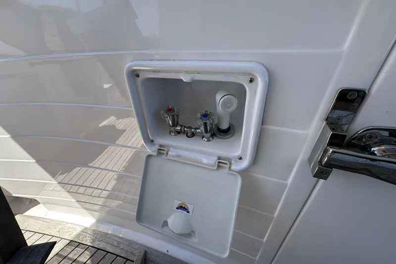 Slide: The Image of Outdoor shower compartment on a 2021 Kadey-Krogen 44AE yacht. - 55