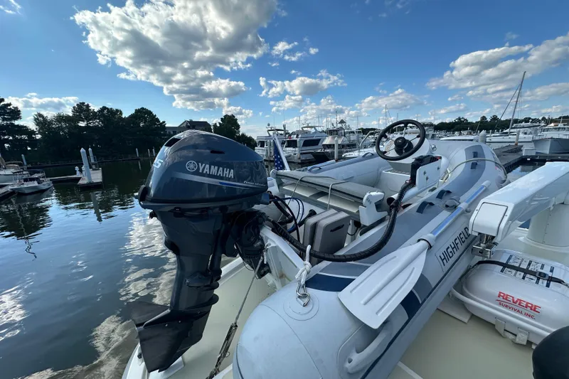 Slide: The Image of Kadey-Krogen 44AE 2021 yacht with Yamaha motor and Highfield inflatable boat at marina. - 56