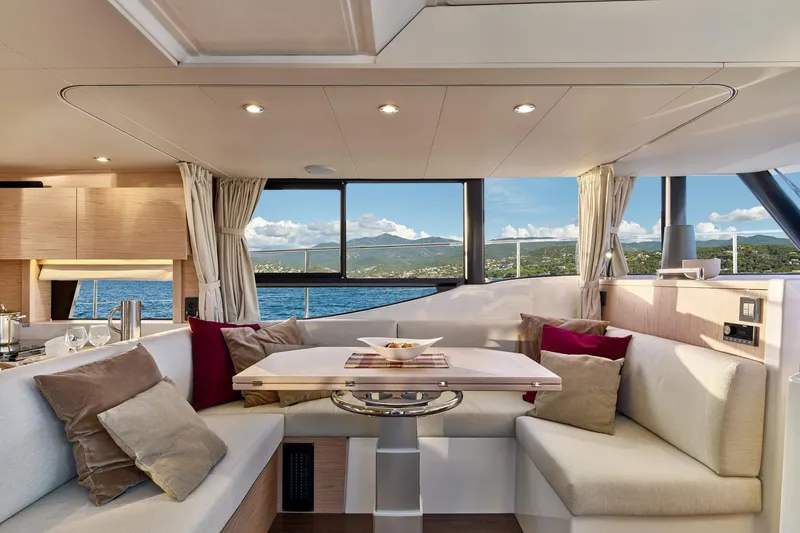 Slide: The Image of Luxurious interior of 2026 Beneteau Swift Trawler 48 with scenic ocean view. - 6