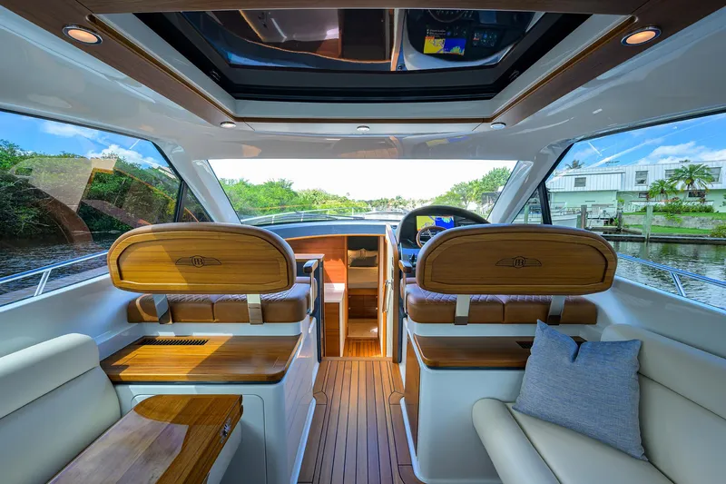 Slide: The Image of Luxurious interior of 2024 Palm Beach Motor Yachts GT50, featuring elegant wood finishes. - 40