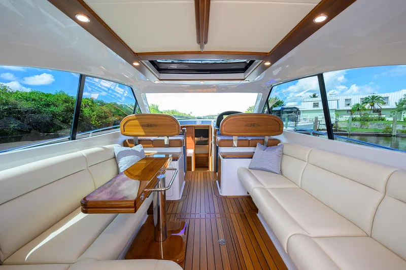 Slide: The Image of Luxurious interior of 2024 Palm Beach Motor Yachts GT50 with elegant seating and wooden accents. - 41