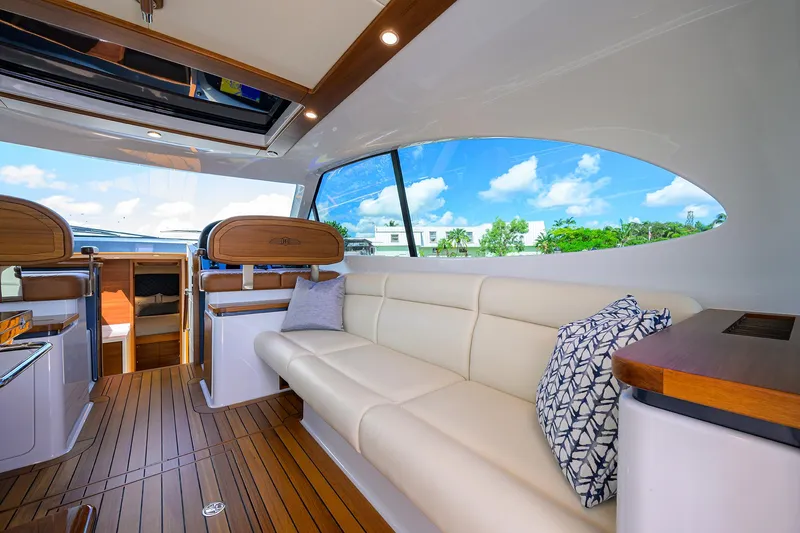 Slide: The Image of Luxurious interior of 2024 Palm Beach Motor Yachts GT50 with elegant seating and wood accents. - 43