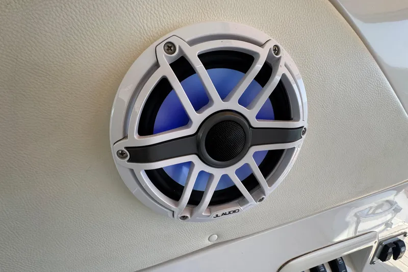 Slide: The Image of JL Audio speaker on 2013 Sessa Marine C44 Cruiser, mounted on white panel. - 21