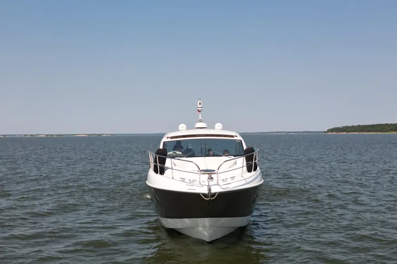 Slide: The Image of 2013 Sessa Marine C44 Cruiser on open water, front view. - 4