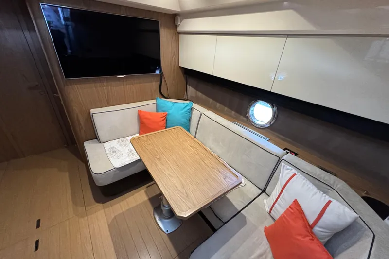 Slide: The Image of Interior of 2013 Sessa Marine C44 Cruiser with cozy seating and modern decor. - 40