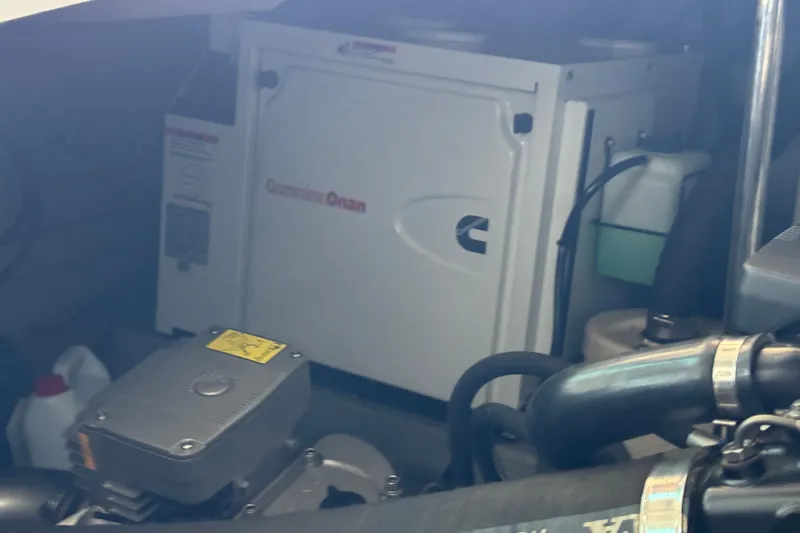 Slide: The Image of Engine compartment of a 2013 Sessa Marine C44 Cruiser with Cummins Onan generator. - 52