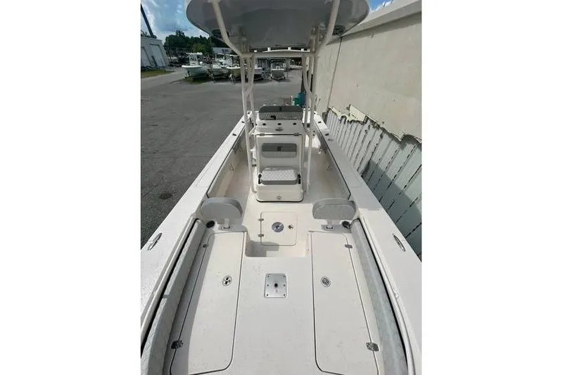 Slide: The Image of 2026 Carolina Skiff 24 Ultra Elite boat interior, featuring spacious deck and seating. - 4