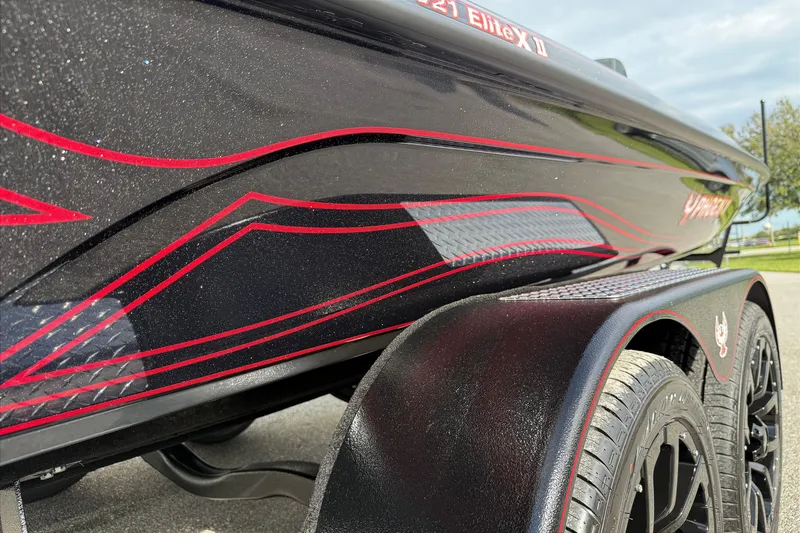 Slide: The Image of 2026 Phoenix 921 Elite X II boat interior with sleek seating and modern design. - 11