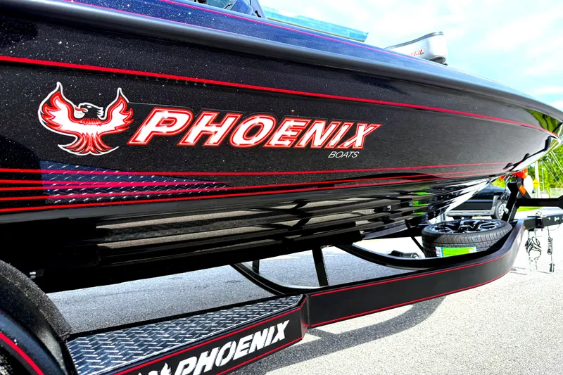 Slide: The Image of 2026 Phoenix 921 Elite X II boat interior with dual seats and sleek design. - 12