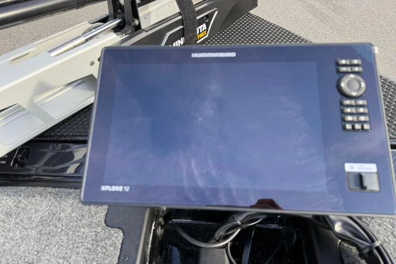 Slide: The Image of Dashboard of 2026 Phoenix 921 Elite X II with Humminbird Xplore 12 display. - 15