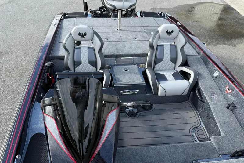 Slide: The Image of 2026 Phoenix 921 Elite X II boat dashboard with steering wheel and digital display. - 17