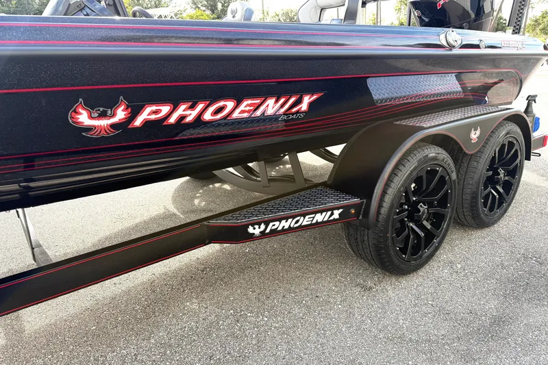 Slide: The Image of Close-up of 2026 Phoenix 921 Elite X II with red accents and sleek design. - 6