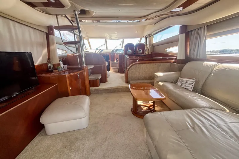 Slide: The Image of Luxurious interior of 2004 Viking Princess 61 Fly Bridge yacht with elegant furnishings. - 22