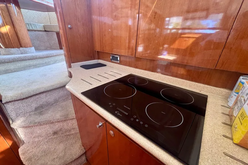 Slide: The Image of Luxurious kitchen area in 2004 Viking Princess 61 Fly Bridge yacht. - 29