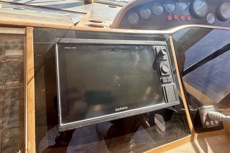 Slide: The Image of Garmin GPS display on 2004 Viking Princess 61 Fly Bridge yacht dashboard. - 33