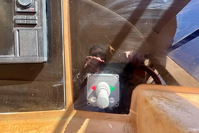 Slide: The Image of Control panel of a 2004 Viking Princess 61 Fly Bridge yacht with Side-Power joystick. - 36