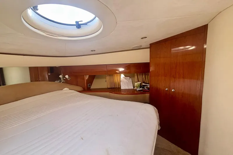 Slide: The Image of Luxurious cabin interior of 2004 Viking Princess 61 Fly Bridge yacht. - 43