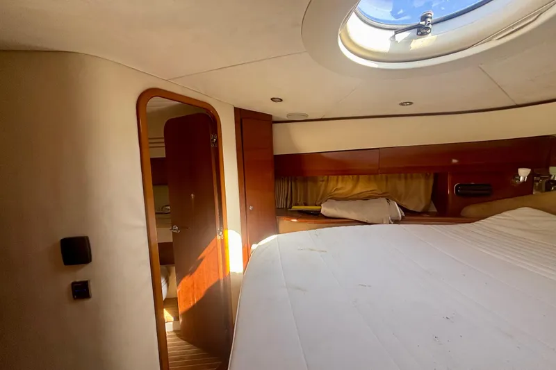 Slide: The Image of Luxurious cabin interior of 2004 Viking Princess 61 Fly Bridge yacht. - 44