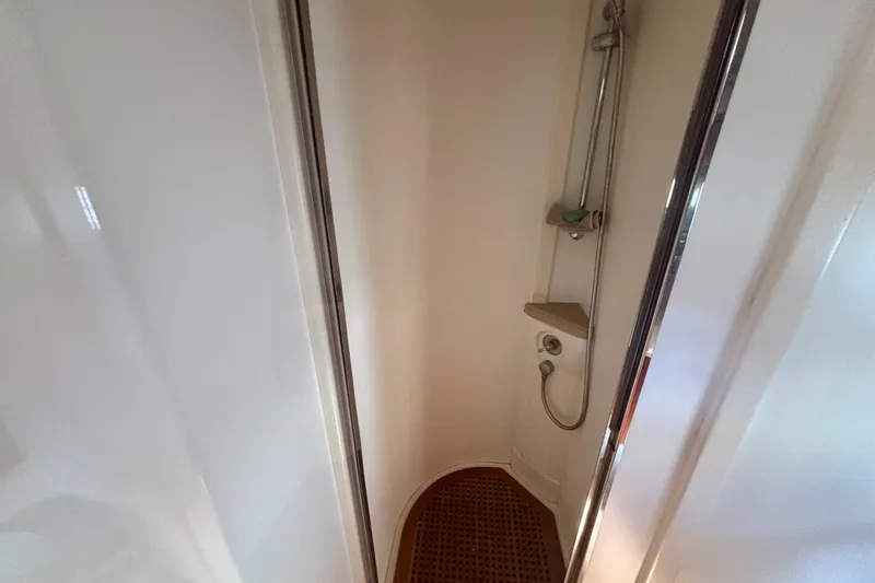 Slide: The Image of Shower area in 2004 Viking Princess 61 Fly Bridge yacht, featuring sleek design and modern fixtures. - 47