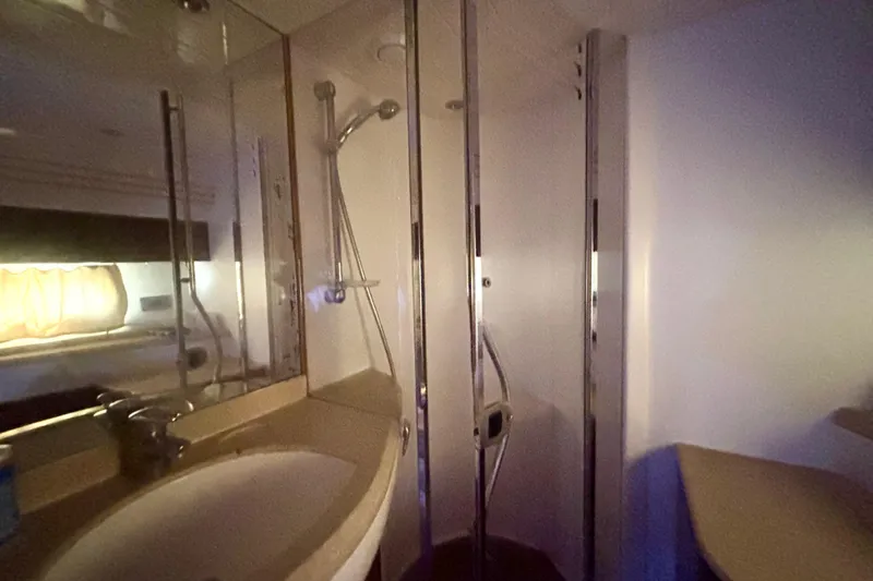 Slide: The Image of Luxurious bathroom interior of 2004 Viking Princess 61 Fly Bridge yacht. - 52