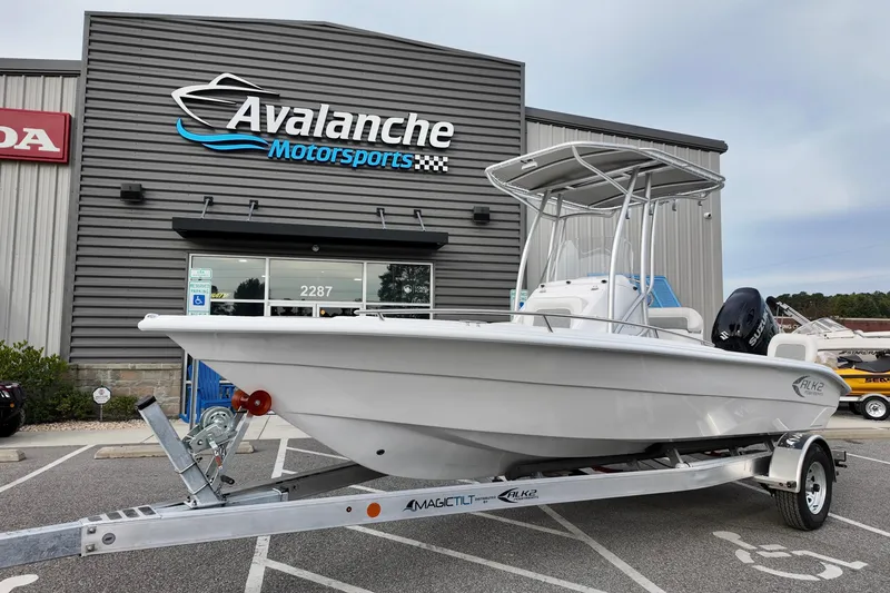 The Image of 2026 ALK2 22CRX boat on trailer at Avalanche Motorsports dealership. - 1
