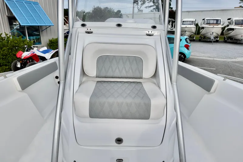 Slide: The Image of Front seating area of ALK2 22CRX boat, 2026 model, with diamond-patterned upholstery. - 8
