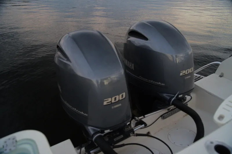 Slide: The Image of Twin Yamaha 200 outboard engines on a 2020 Sailfish 270 WAC boat. - 21