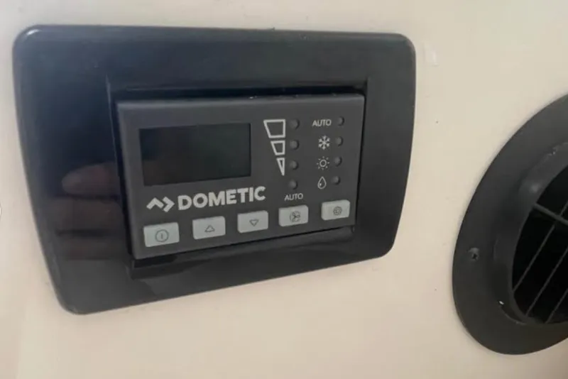 Slide: The Image of Dometic control panel on 2020 Sailfish 270 WAC boat interior. - 28