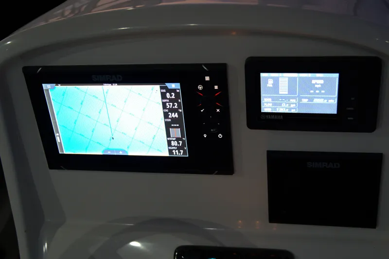 Slide: The Image of Simrad navigation display on 2020 Sailfish 270 WAC boat dashboard. - 30