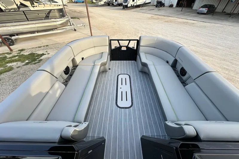 Slide: The Image of 2024 Veranda VX 25 DCVL pontoon boat interior with spacious seating and modern design. - 12