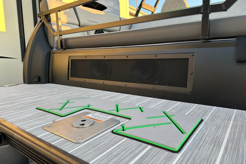 Slide: The Image of 2024 Veranda VX 25 DCVL interior with speaker and seating detail. - 27