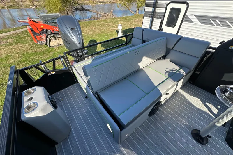 Slide: The Image of 2024 Veranda VX 25 DCVL pontoon boat interior with stylish seating and modern design. - 32