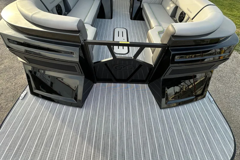 Slide: The Image of 2024 Veranda VX 25 DCVL pontoon boat with sleek seating and modern design. - 9