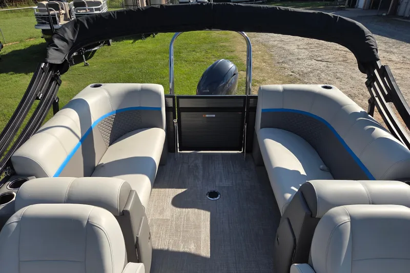 Slide: The Image of 2023 Qwest RLS 820 pontoon boat interior with plush seating and modern design. - 14
